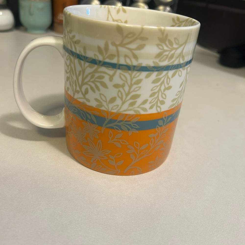 Starbucks Orange and Cream Leaf Pattern Mug